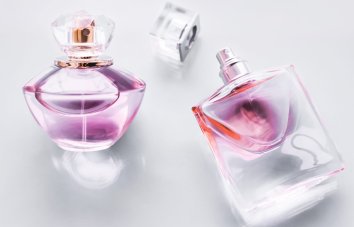 Bottles of high‑end fragrances and perfumes